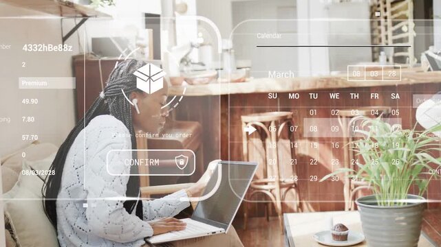 Woman in cafe tapping laptop showing maps calendar charts glancing reaching cup confirming delivery
