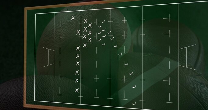 Displaying framed playboard showing white markings on coaching wall, wood frame and pebbled texture