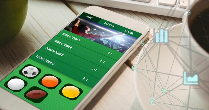 Smartphone displaying sports app on home office desk, showing red jersey player, sport icons, apple