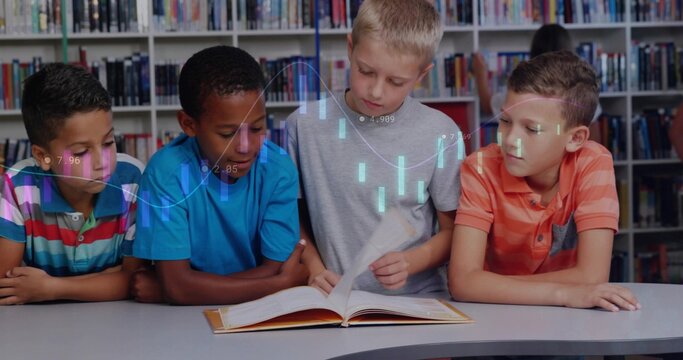 Reading four boys in bright shirts leaning over curved table at school library, with open book