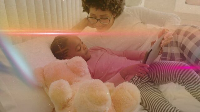 Girl tapping tablet in bedroom, parent guiding tech play while overlay washing out, bear visible