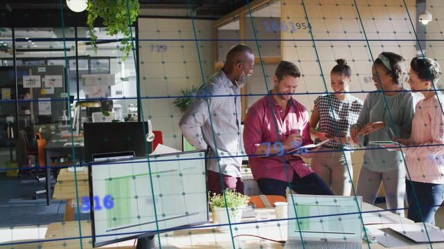 Team of five leaning in as seated man tapping tablet in business office, gridlines aiding decision