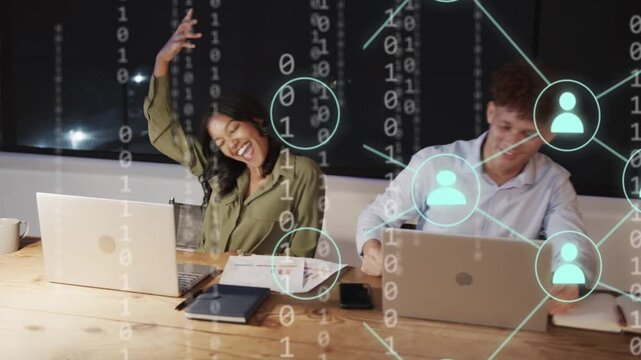 Team meeting eyes, shaking then high-fiving showing binary nodes celebrating tech win resuming work