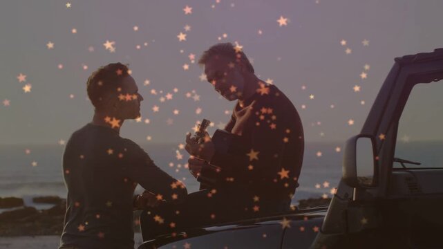 Guitarist starting to play on vehicle, sharing moment with companion, star overlay accenting music