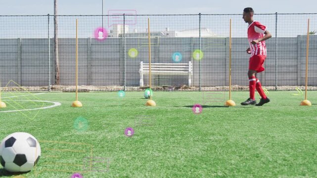 Lead player touching soccer ball and weaving poles for drill as partner follows icons showing data