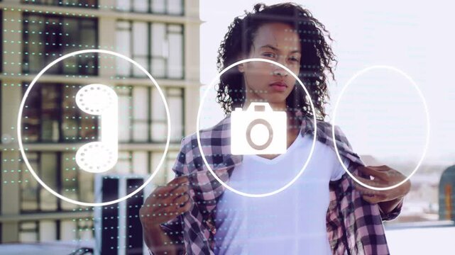 Female model adjusting plaid shirt, posing on rooftop as UI icons entering frame, driving marketing