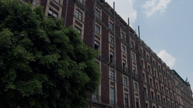 Cinematic slow zoom on a historic colonial building facade in Mexico City Zocalo, 4K ProRes