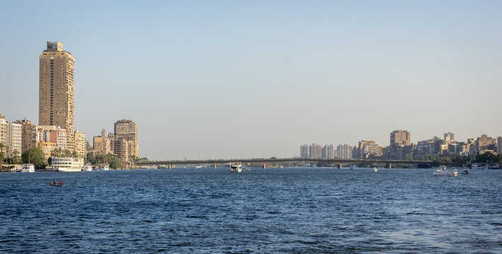 Cairo skyline and Nile River with residential towers and boats