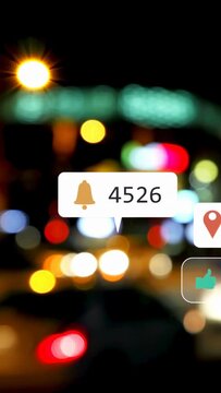 Vertical video: Frame four showing night bokeh, alerts popping and shifting to show app engagement