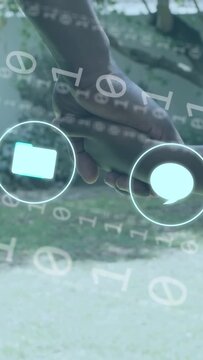 Vertical video: Dad and son holding and guiding path, handhold starting tech UI icons then receding