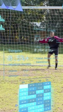Vertical video: GK moving left reacting to soccer ball rolling in trying block as AR grid updating
