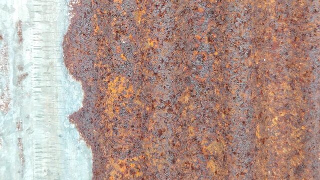 wall of rusty corrugated iron sheets