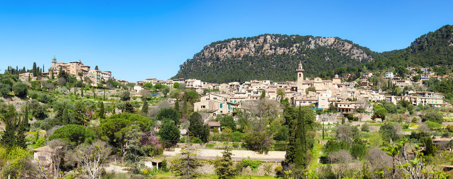 Valldemossa village on Mallorca island panorama with church summer holiday at Serra de Tramuntana in Spain