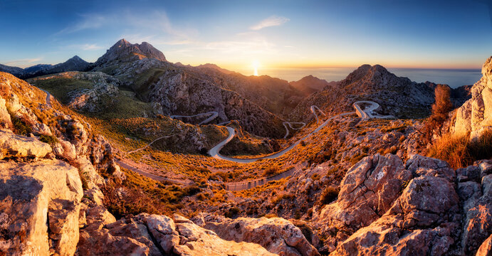 Stunning landscape with the famous Sa Calobra Road in Mallorca, Balearic Islands, Spain. A winding scenic road in Tramuntana Mountains on Majorca island at sunset. Famous Nus de sa Corbata