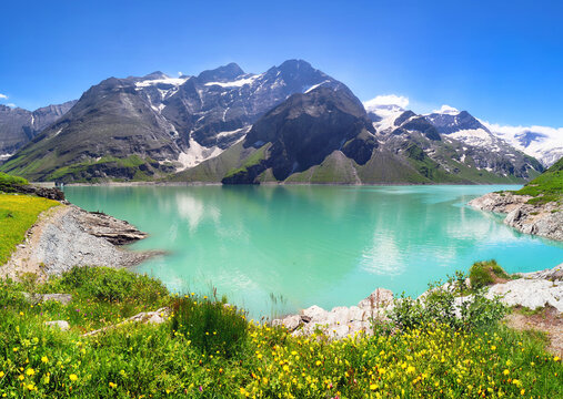 Idyllic summer landscape with clear mountain amd alpine lake in the Alps, Austria - Hohe Tauern near Kaprun, Mooserboden