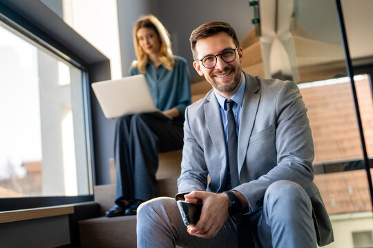 A modern business team uses technology, digital workflow, online tools, and workplace innovation