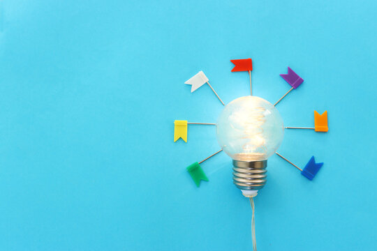 Education concept image. Creative idea and innovation. light bulb over blue background