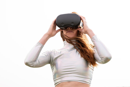 Interacting with futuristic VR glasses outdoors in Granada