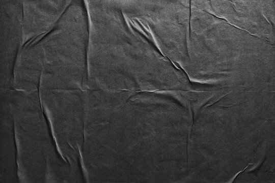 Wrinkled Black Glued Paper Texture Background with Wet Creases