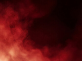 Fototapeta premium Captivating red smoke against a dark background, creating an atmospheric and mysterious abstract effect.
