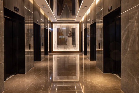 Modern hotel hallway interior with elevators