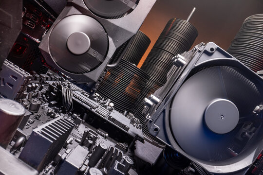 Detailed view of motherboards with processor and graphics card.
