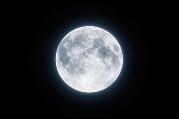 Obraz premium Bright moon rising sharply against a solid black sky background