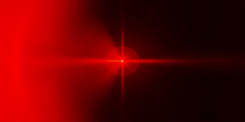 A striking abstract image showcases a vibrant red light against a dark backdrop, creating an intense visual impact.  © nur