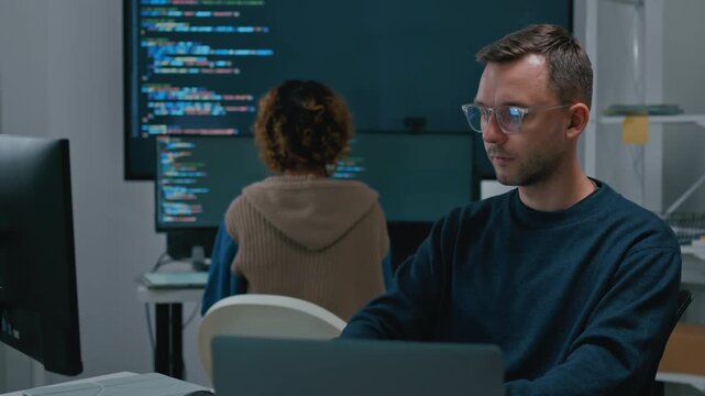 Adult male,asian female freelance typing write prompt AI bot IT app smart program,develop agentic ai,terminal with coding language,ux ui interface,designer,big data server center,quantum computer.