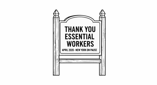 Wooden sign with message of thanks to essential workers for New York on pause