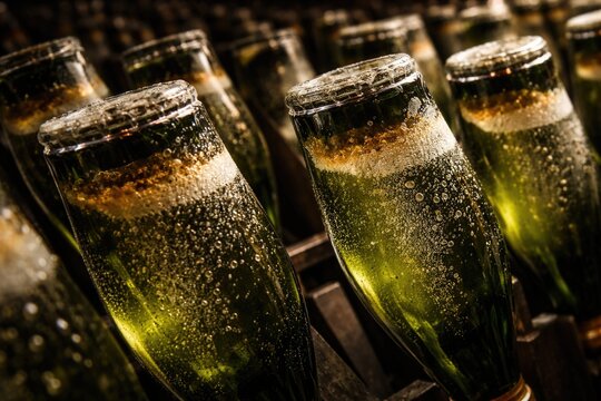 Fermentation in progress with champagne bottles rotating closely viewed