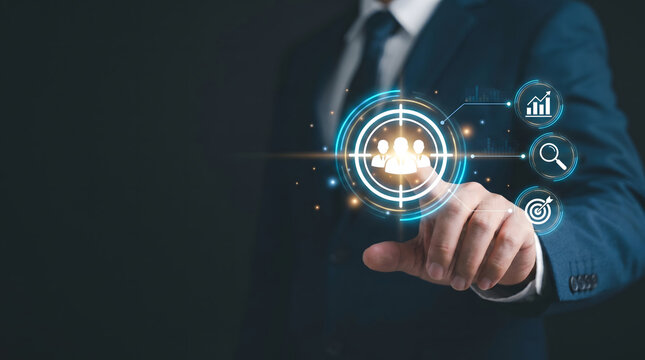 Businessman touching virtual target audience hologram for digital marketing and customer segmentation concept, Targeted marketing and business strategy background 