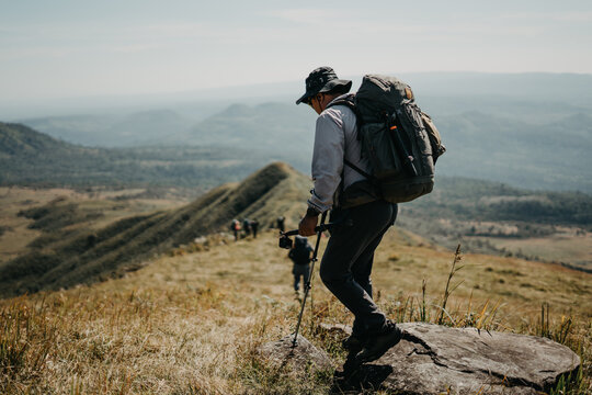 Hiking adventure in scenic mountains outdoor exploration nature daytime thrilling journey