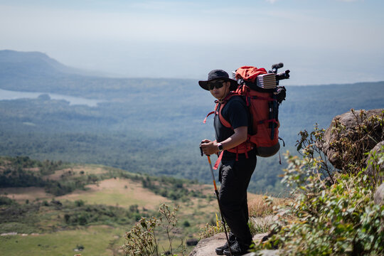 Hiking adventure mountain landscape outdoor activity scenic view explorer perspective thrill of nature