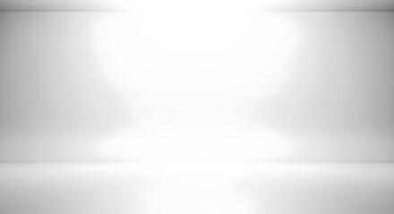 Naklejka premium Minimalist empty white studio room with reflective floor and soft lighting.