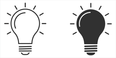 Two light bulb icons one outlined and one solid black representing ideas and innovation concept creativity © ripon29