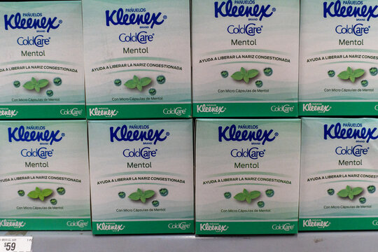 Villa de Alvarez, Colima. Mexico. April 14, 2026: Multiple Boxes of Kleenex ColdCare Menthol Tissues Displayed on a Shelf