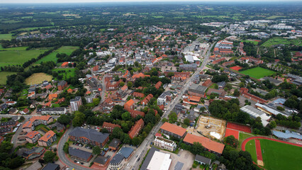 Fototapeta premium Aerial view around the old town of the city Kaltenkirchen in Germany on a sunny spring noon