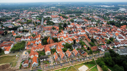 Fototapeta premium Aerial view around the old town of the city Verden in Germany on a sunny spring noon