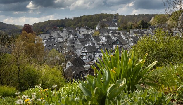 The historic centre with half timbered houses of Friedensdorf Germany, a village in the municipality of Saerbeck, district Steinfurt, the state of North Rhine-Westphalia. View on the town