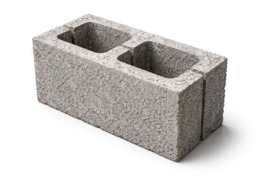 Close up of a concrete shuttering block isolated on white background