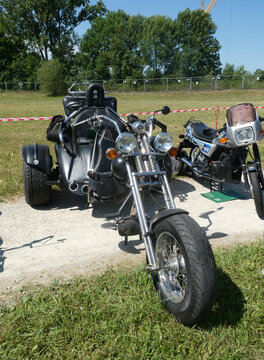 Three wheels motorbike comfort and versatile touring, lateral view