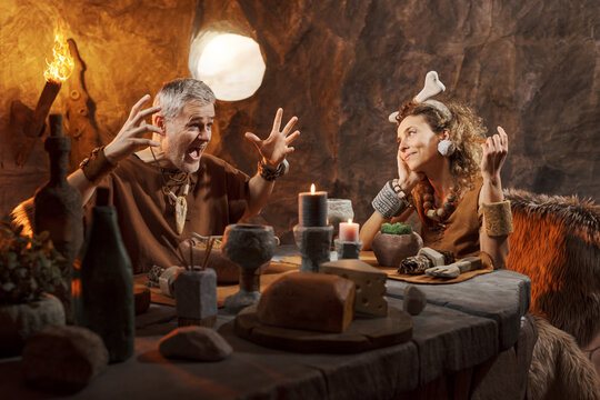 Caveman Talking Enthusiastically to His Date &ndash; Prehistoric Conversation and Relationship Dynamics Concept