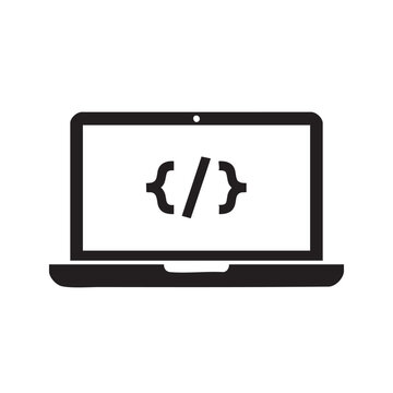 Code symbol on laptop screen representing programming and development