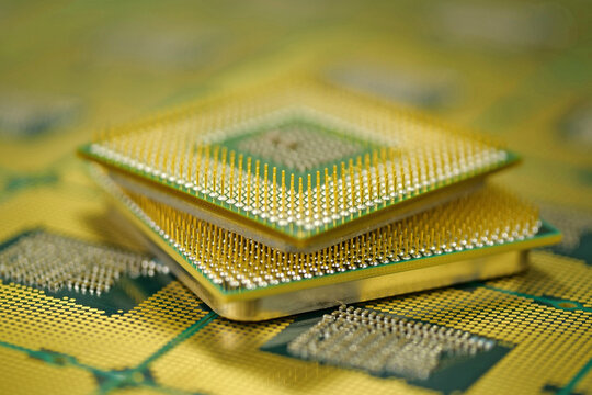Detailed macro of processor contacts illustrating advanced computer hardware