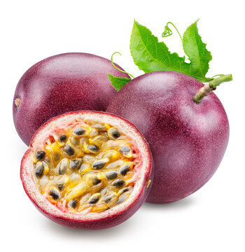 Fresh ripe passion fruit with half passionfruit showing juicy pulp and seeds, accompanied by green leaves, isolated on white background with clipping path.