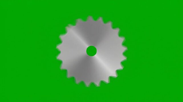A shiny silver circular saw blade stands out on green.