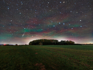 Starry landscape with a comet and airglow. High resolution. © Filip