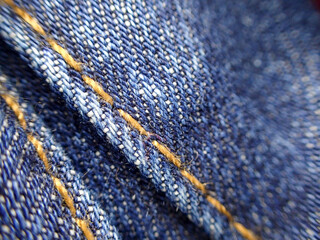 Gros plan sur la texture d'un jean bleu. Fond en jean bleu. Macro de la texture d'un jean bleu. © Pascal Huot