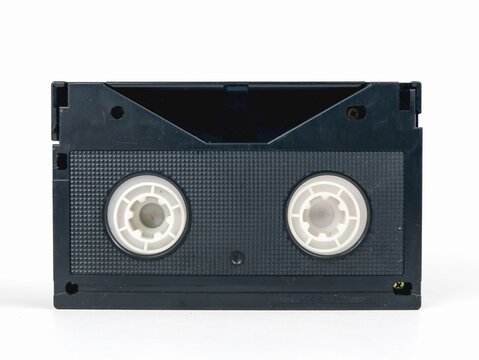 Vintage magnetic tape cassette for video isolated on white background